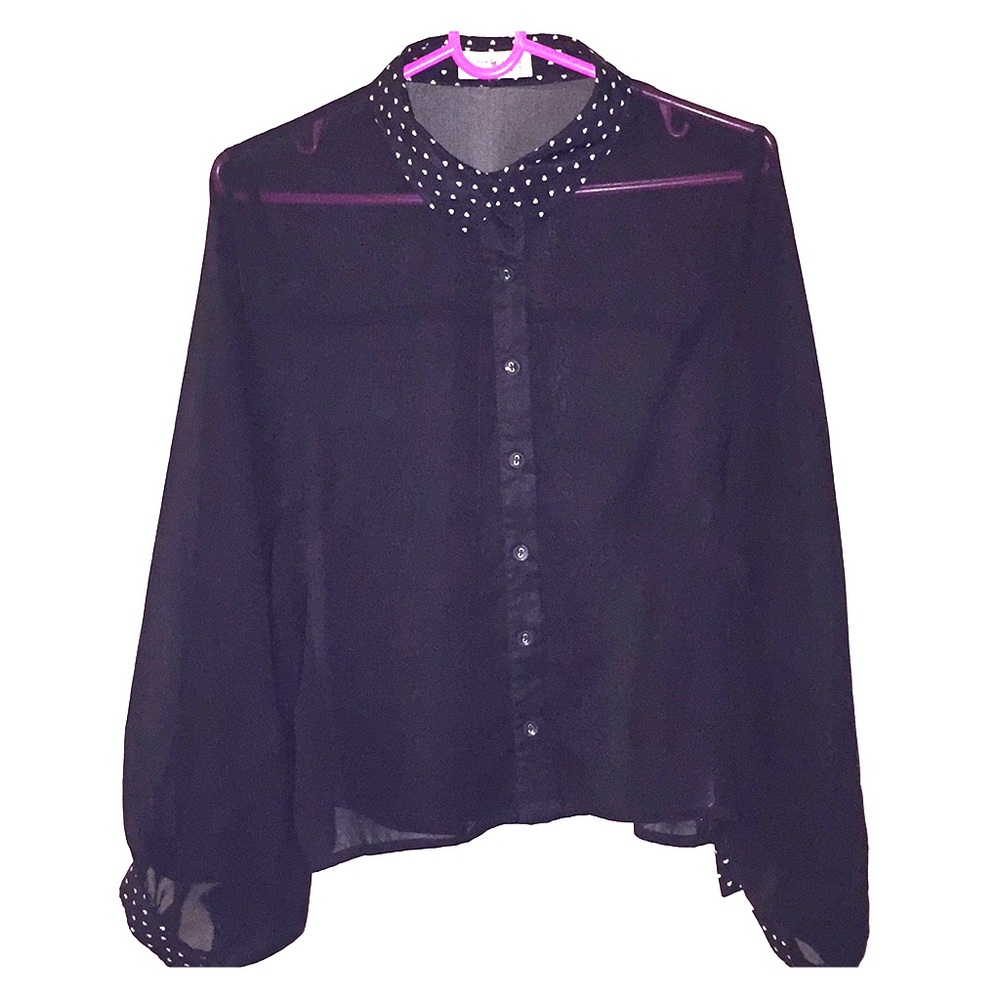 A black polka dotted (collar/cuffs) button up.